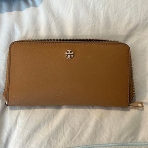 Brown Tory Burch wallet with detachable wrist strap